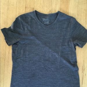 women’s *Patagonia* Merino wool top. Size M.